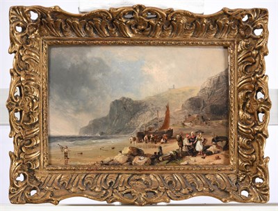 Lot 1136 - Circle of William Collins (1788-1847) Fisherfolk and beached vessels on a rugged shore Oil on...