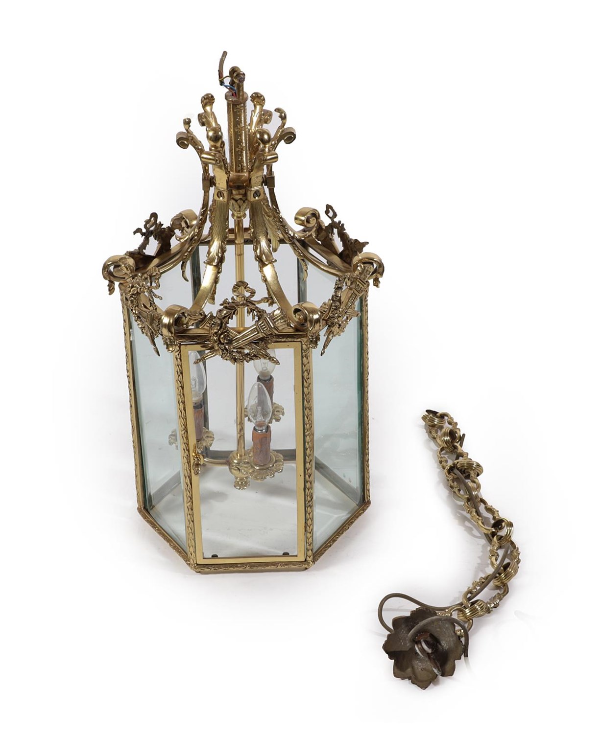 Lot 8 - A Late Victorian Brass Lantern of Hexagonal Form, the central plain shaft issuing three...