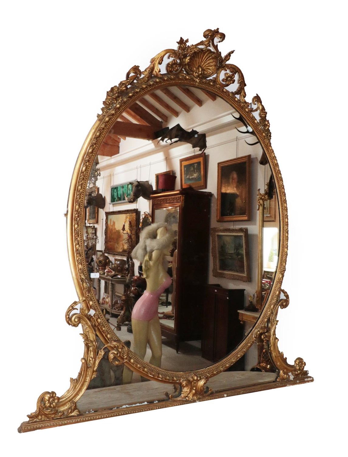 Lot 58 - A Large Louis XVI Style Giltwood and Gesso Overmantel Mirror, 19th century, the oval mirror...
