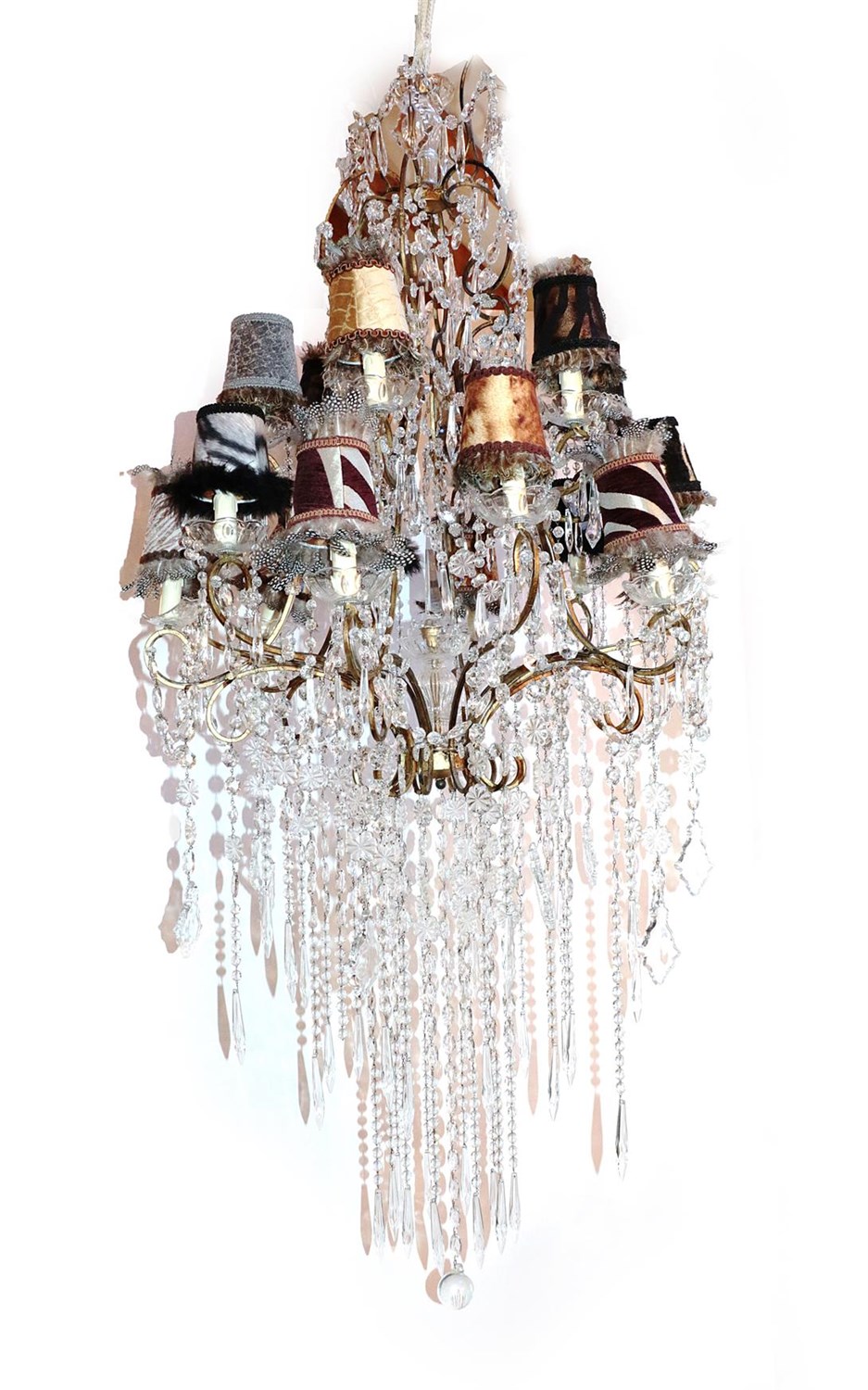 Lot 64 - A Cut Glass and Gilt Metal Eighteen-Light Chandelier, with scroll branches hung with faceted...