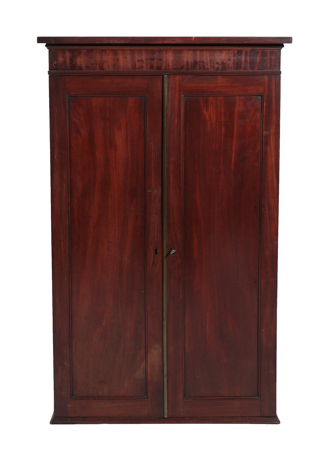 Lot 65 - A Mahogany Wall Cabinet, 2nd quarter 19th century, with two panel doors enclosing an arrangement of