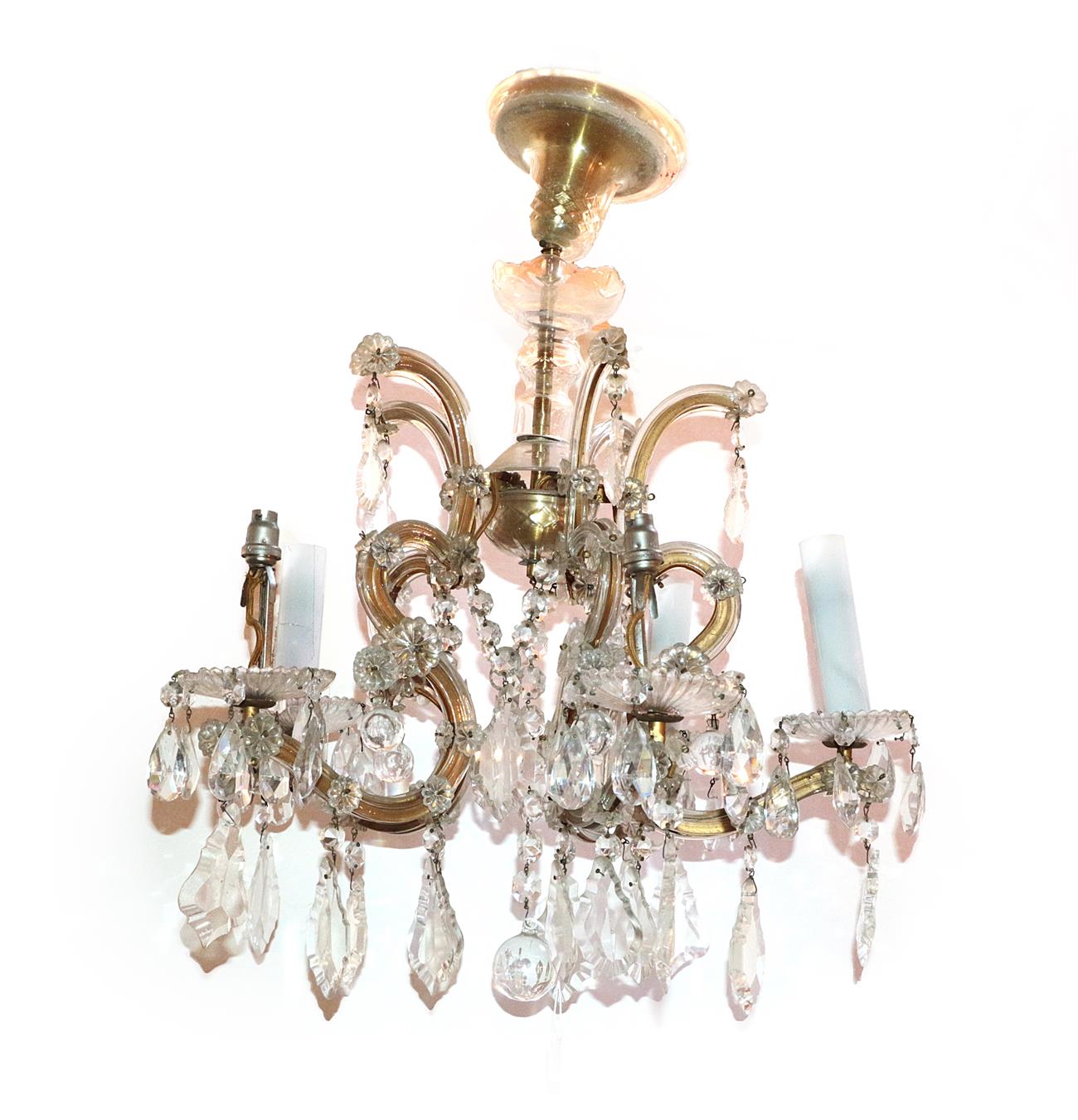 Lot 76 - A Cut Glass Five-Light Chandelier, with baluster stem, scroll branches and fluted sconces hung with