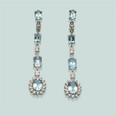 Lot 562 - A Pair of Aquamarine and Diamond Earrings, graduated oval cut aquamarines alternate with chain...