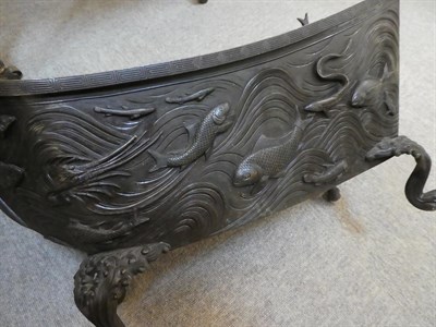 Lot 92 - A Japanese Bronze Jardiniere, Meiji period, of boat form, cast in relief with fish amongst...
