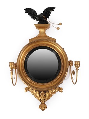 Lot 103 - A William IV Giltwood Convex Girandole Mirror, 2nd quarter 19th century, with ebonised and...