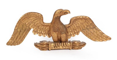 Lot 108 - A Giltwood and Gesso Cresting, 19th century, as an eagle, its wings outstretched perched on a...