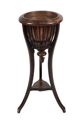 Lot 122 - An Edward VII Mahogany Basket Jardiniere, having a copper liner, with turned pendant finial, on...