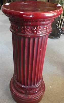 Lot 123 - A Pair of Dunmore Sang de Boeuf Glazed Earthenware Pedestals, circa 1900, with anthemion...