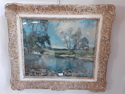 Lot 131 - Reginald Grange Brundrit (1883-1966)  River landscape on a bright day   Signed, oil on canvas,...