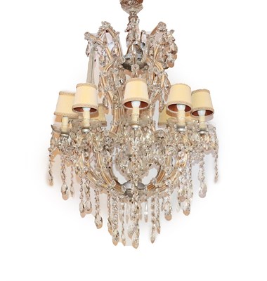 Lot 132 - A Cut Glass Ten-Light Chandelier, in Victorian style, the scroll branches hung with faceted...