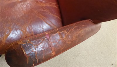 Lot 136 - A Vintage Office Chair, labelled Fita Keith Low Ltd Dudley Works, covered in worn red leather,...