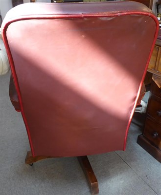 Lot 136 - A Vintage Office Chair, labelled Fita Keith Low Ltd Dudley Works, covered in worn red leather,...