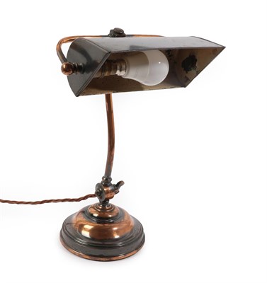 Lot 149 - A Lacquered Copper Desk Light, early 20th century, with rectangular shade, articulated scroll...