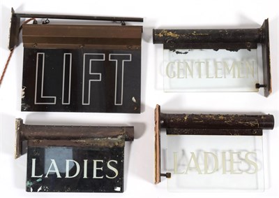 Lot 153 - A Pair of Illuminated Glass Signs, 20th century, inscribed LADIES and GENTLEMEN, with lacquered...
