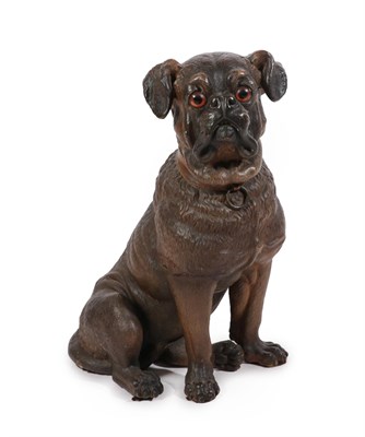 Lot 189 - An Austrian Painted Terracotta Figure of a Pug, circa 1900, seated, with glass eyes and brown...