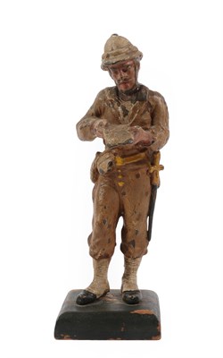 Lot 190 - A Cold Painted Metal Figure of a Gentleman, early 20th century, standing wearing a pith helmet...