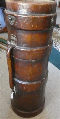 Lot 195 - A Leather Bound Umbrella Stand, in the form of an ammunition carrier, of ribbed cylindrical...