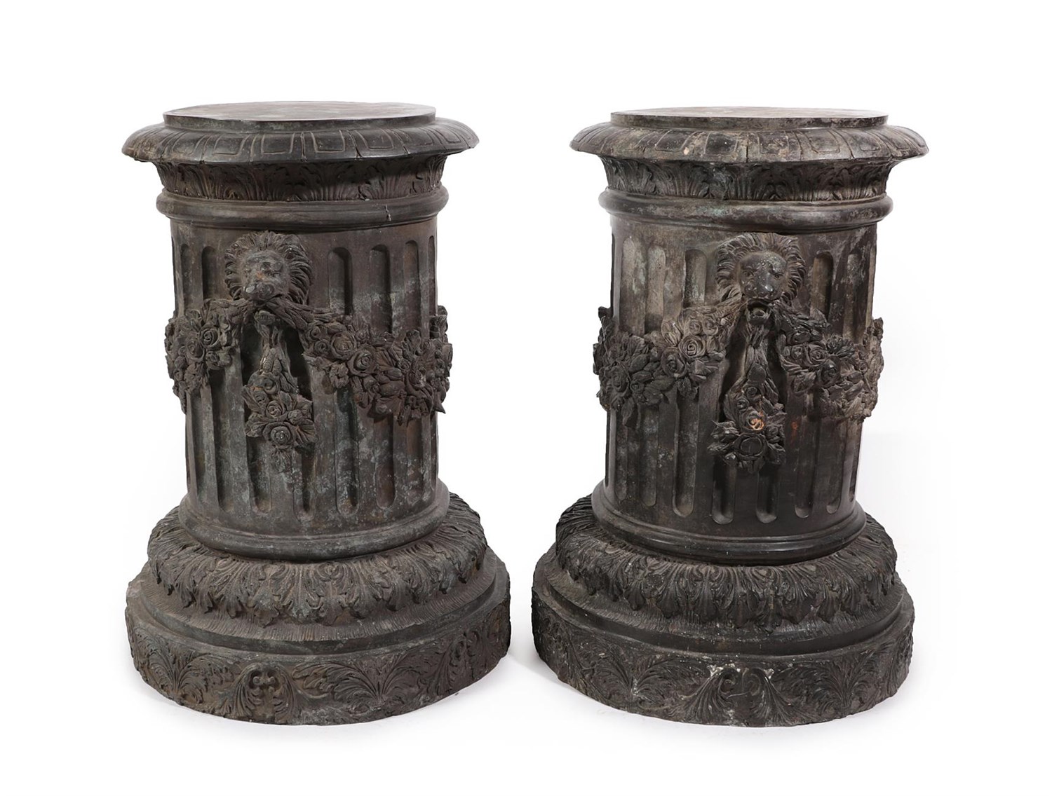 Lot 215 - A Pair of Bronzed Columns, late 19th/early 20th century, of fluted cylindrical form, decorated with