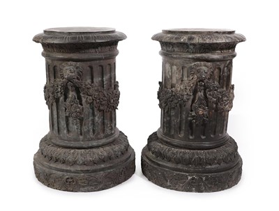 Lot 215 - A Pair of Bronzed Columns, late 19th/early 20th century, of fluted cylindrical form, decorated with