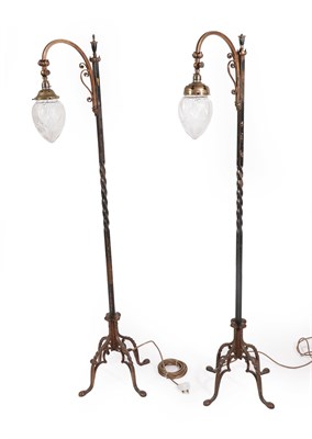 Lot 216 - A Pair of Gilt and Patinated Wrought Iron Standard Lamps, late 19th/early 20th century, with...