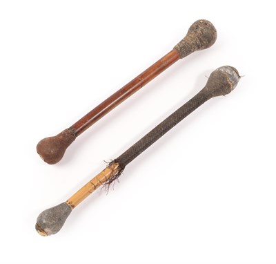 Lot 227 - Two 19th Century 'Life Preservers', one with lead weighted ends joined by a cane haft with...