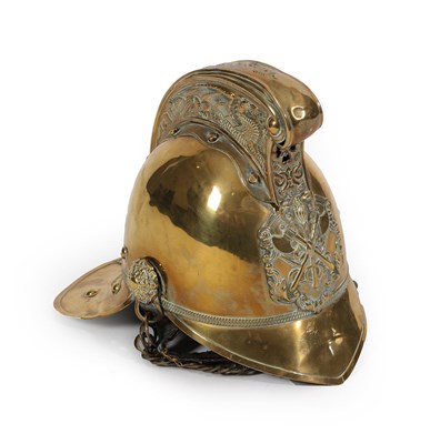 Lot 231 - A Late 19th/Early 20th Century Brass Fireman's Helmet, the high comb with dragon decoration,...