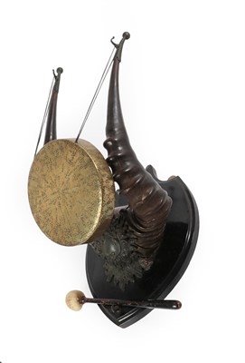 Lot 233 - Antlers/Horns: A Pair of Cape Red Hartebeest Horns Dinner Gong, the horns supported by a cast metal