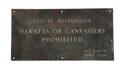 Lot 256 - A Patinated Brass Plaque, inscribed CITY OF WESTMINSTER HAWKERS AND CANVASSERS PROHIBITED AG DAWTRY