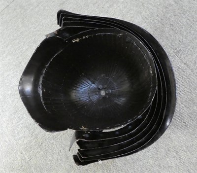 Lot 276 - An Early/Mid 19th Century Japanese Kabuto, of black lacquered metal, the shallow oval fluted...