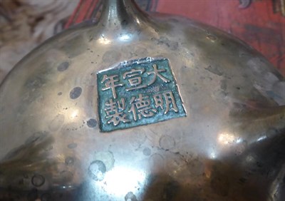 Lot 277 - A Chinese Bronze Censer, Xuande reign mark but not of the period, of circular form with loop...