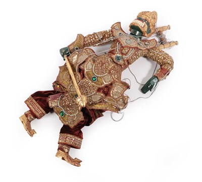 Lot 280 - A Thai Marionette, 20th century, with painted wood and fabric and green face with elaborate...