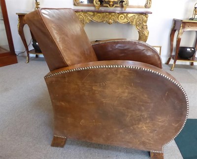 Lot 282 - A Pair of 1930's Rosewood Framed Club Armchairs, covered in vintage close-nailed brown leather,...