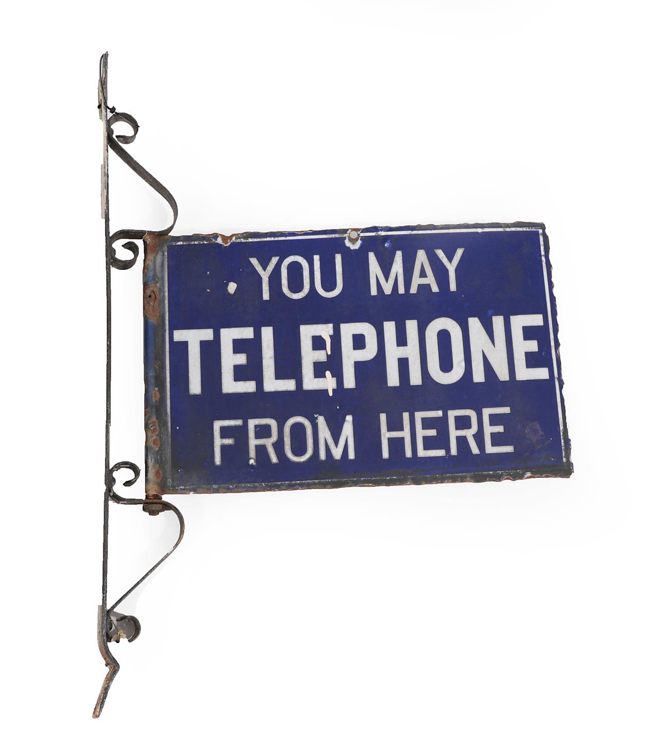 Lot 285 - A Double-Sided Enamel Sign, inscribed YOU MAY TELEPHONE FROM HERE, 30cm by 46cm, with...