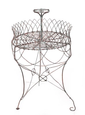 Lot 293 - A Victorian Wirework Etagere, the central circular boss with trefoil over a circular plateau...