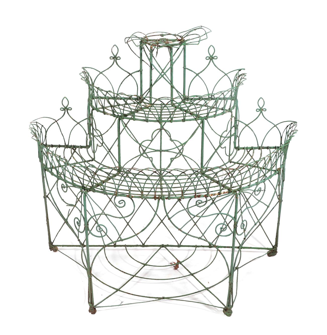 Lot 301 - A Victorian Green Painted Wirework Three-Tier Demi-Lune Etagere, with Gothic arches and...