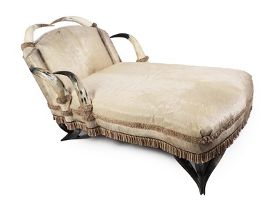 Lot 354 - A Cow Horn Day Bed, by Michael Haillard, sumptuously and luxuriously upholstered in cow hide...