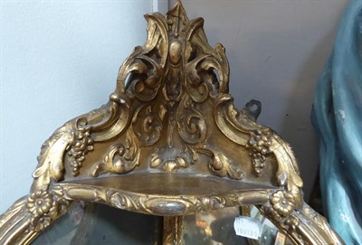 Lot 364 - A Set of Victorian Gilt and Gesso Corner Shelves, mid-19th century, of scrolled form with...