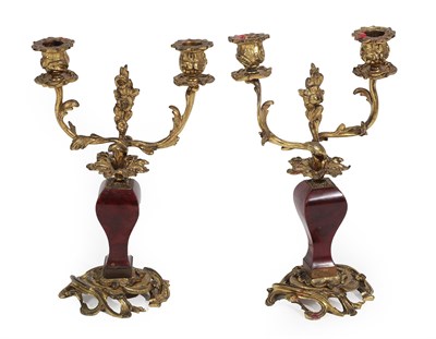 Lot 372 - A Pair of Gilt Metal Mounted Tortoiseshell Candelabra, 19th century, with leaf cast scroll sockets
