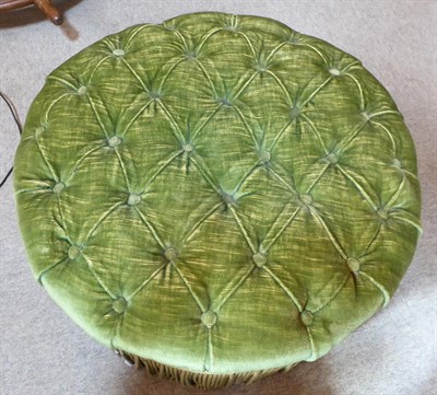 Lot 391 - An Early 20th Century Pouffe, of circular form, covered in buttoned green velvet with...