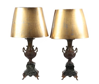 Lot 393 - A Pair of French Patinated Spelter and Verdi Antico Marble Lamps, circa 1900, of urn form with twin