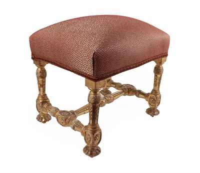 Lot 396 - A George II Style Carved Giltwood Stool, overstuffed seat recovered in red spotted fabric,...