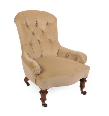 Lot 399 - A Victorian Nursing Chair, circa 1870, recovered in buttoned beige velvet, with a serpentine shaped