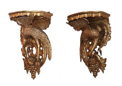 Lot 416 - A Pair of Victorian Giltwood Wall Brackets, the serpentine shaped shelf supported by a bird...