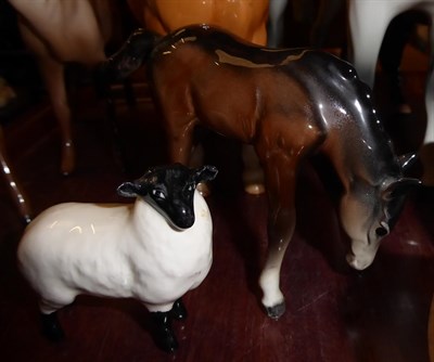 Lot 1 - Beswick horses, pigs and deer including New Forest Pony, Palomino Cob and two foals, together...