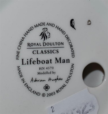 Lot 8 - Two Royal Doulton figures, Balloon Lady HN2935 and Lifeboat Man HN4570
