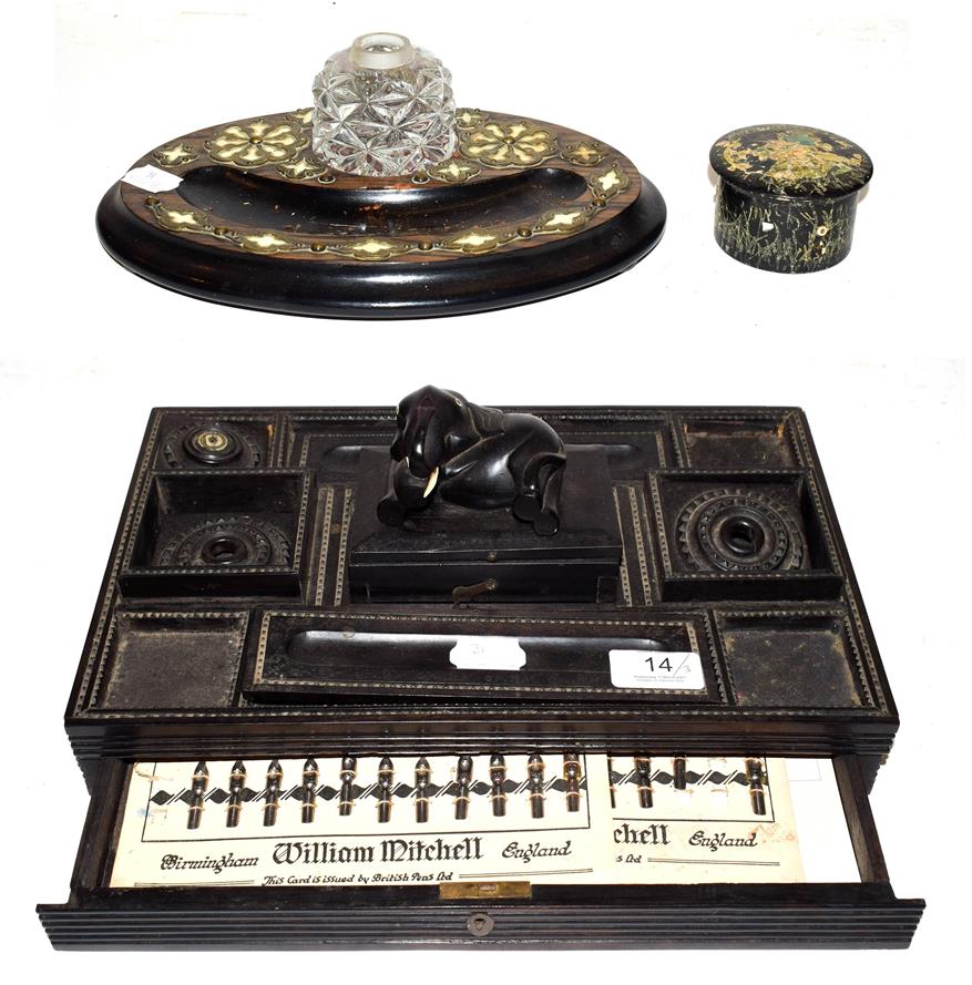 Lot 14 - A 19th century Anglo Indian ebony desk Standish surmounted by an elephant, a Victorian...