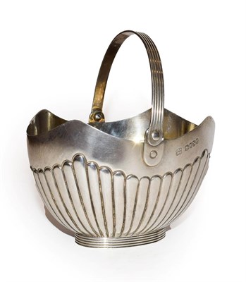 Lot 25 - A Victorian silver sugar basket with swing handle by Hukin & Heath, London, 1888, 151 grams,...