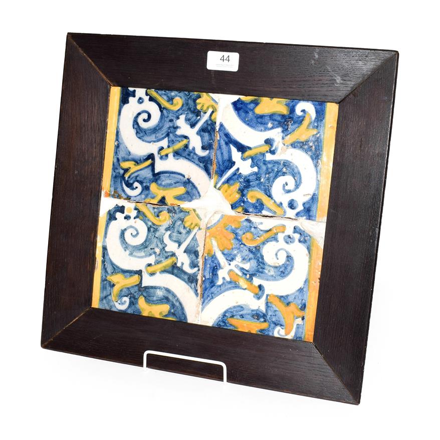 Lot 44 - A framed set of four 17th/18th century polychrome Maiolica tiles, 28cm