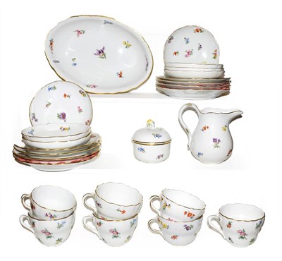 Lot 47 - A quantity of Meissen porcelain tea wares painted with scattered sprigs and three similar tea...