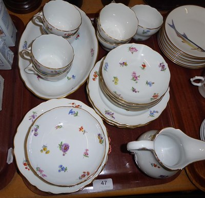 Lot 47 - A quantity of Meissen porcelain tea wares painted with scattered sprigs and three similar tea...